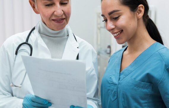 smiley-doctor-talking-with-smiley-nurse_23-2148757330